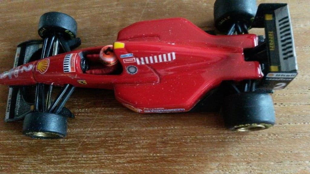 Ferrari F310 1996 Minichamps schaal 1:64 Eddie Irvine, Ophalen of Verzenden, Zo goed als nieuw, Auto, MiniChamps