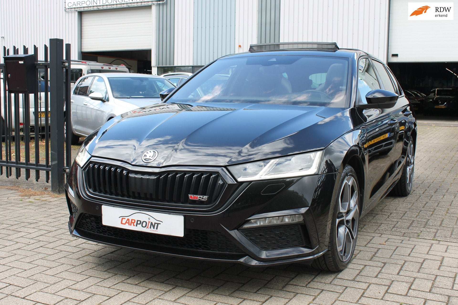 Skoda Octavia Combi 1.4 TSI RS iV PHEV Business Pano HUD Mas, Auto's, Dealer onderhouden, Gebruikt, Zwart, 4 cilinders