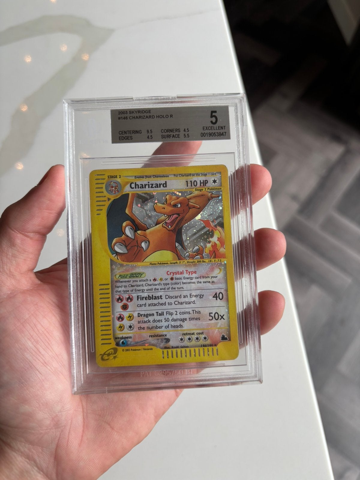 Crystal Charizard Skyridge Beckett 5, Hobby en Vrije tijd, Verzamelkaartspellen | Pokémon, Ophalen of Verzenden, Zo goed als nieuw