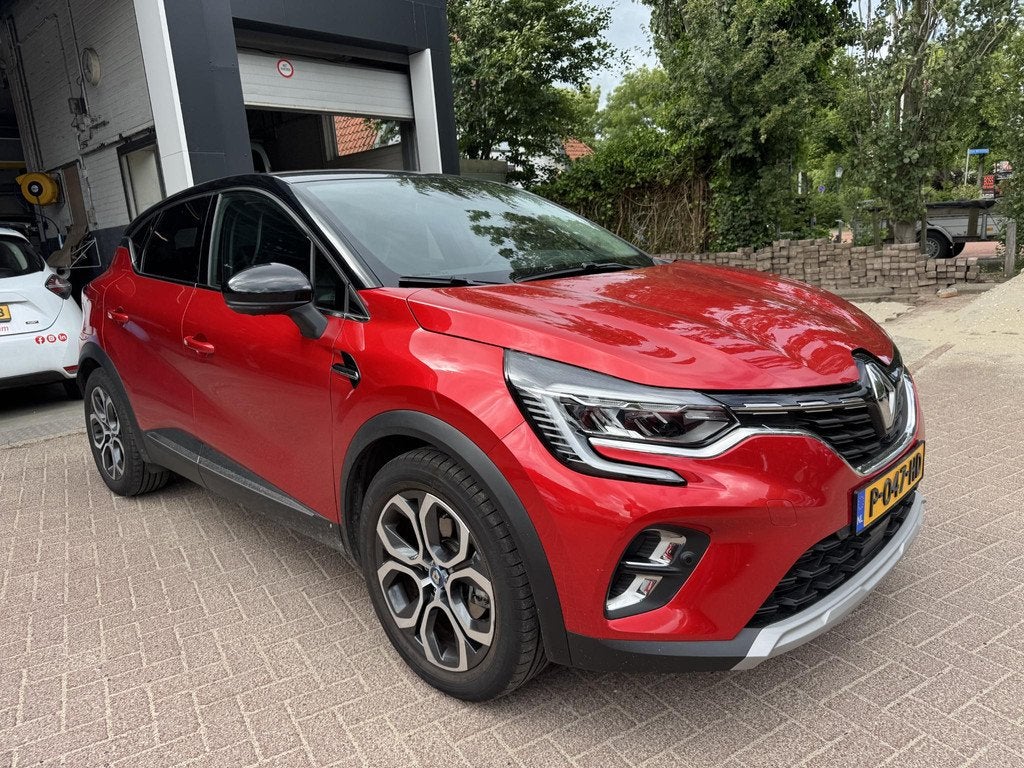 Renault Captur 1.6 E-Tech Hybrid 145 Intens+Trekhaak!, Auto's, Renault, Gebruikt, 715 kg, Leder en Stof, Bedrijf