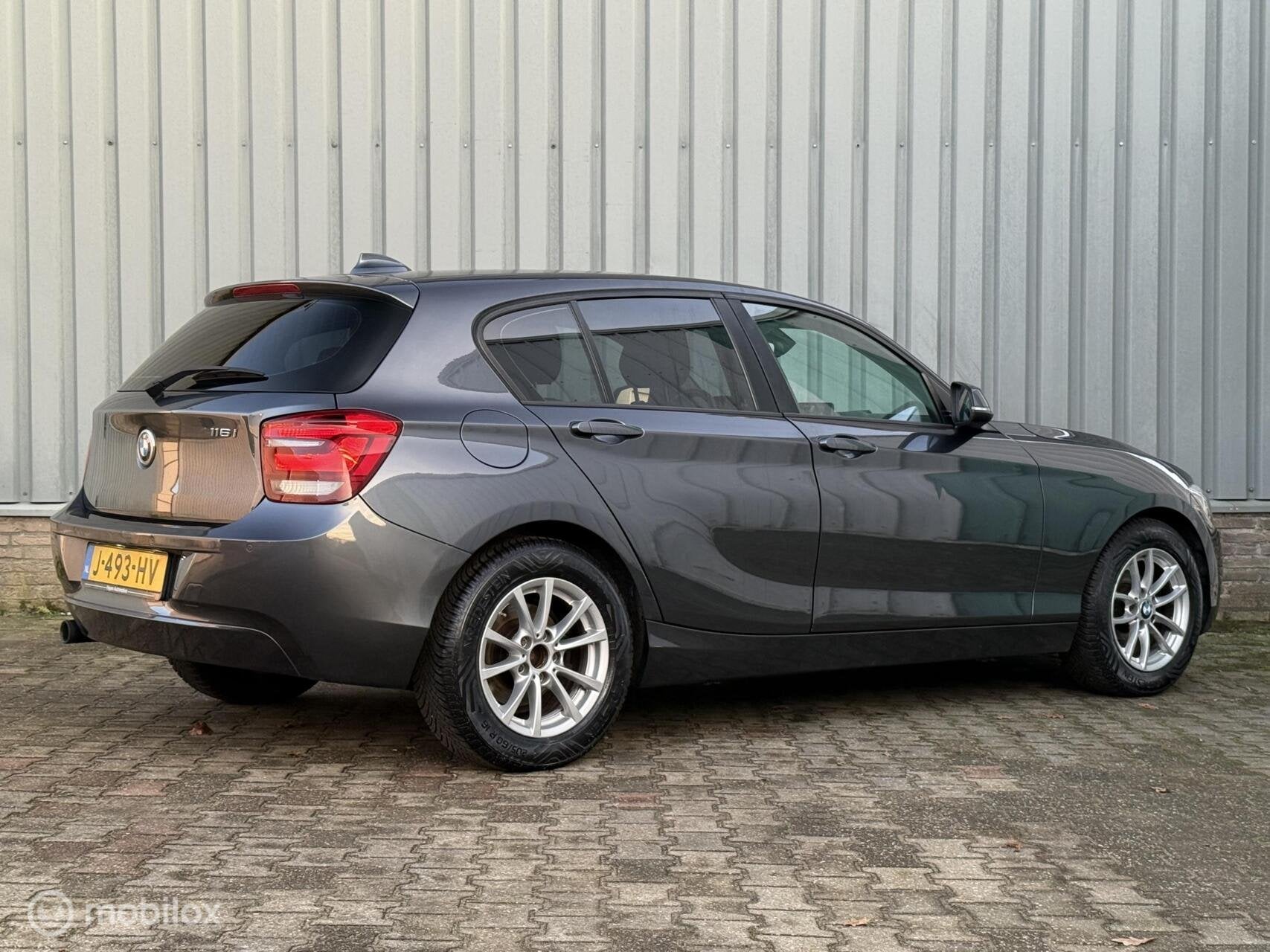 BMW 1-serie 116i EDE | Airco | Stoelverw. | PDC | NAVI, Auto's, 1-Serie, Navigatiesysteem, 4 cilinders, 19 km/l