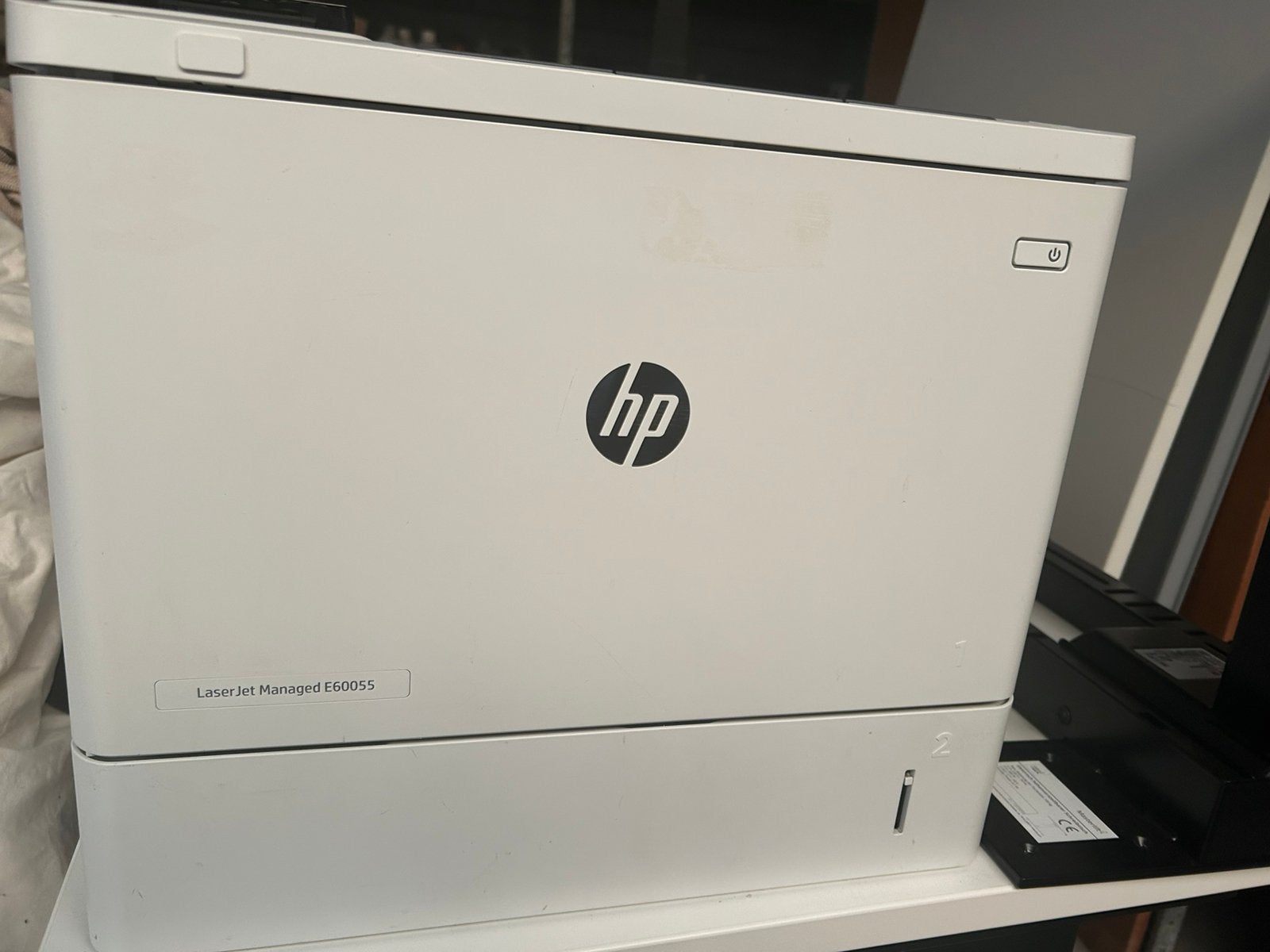 HP. Laser Jet. Maneged.  E 60055, Ophalen, Zo goed als nieuw