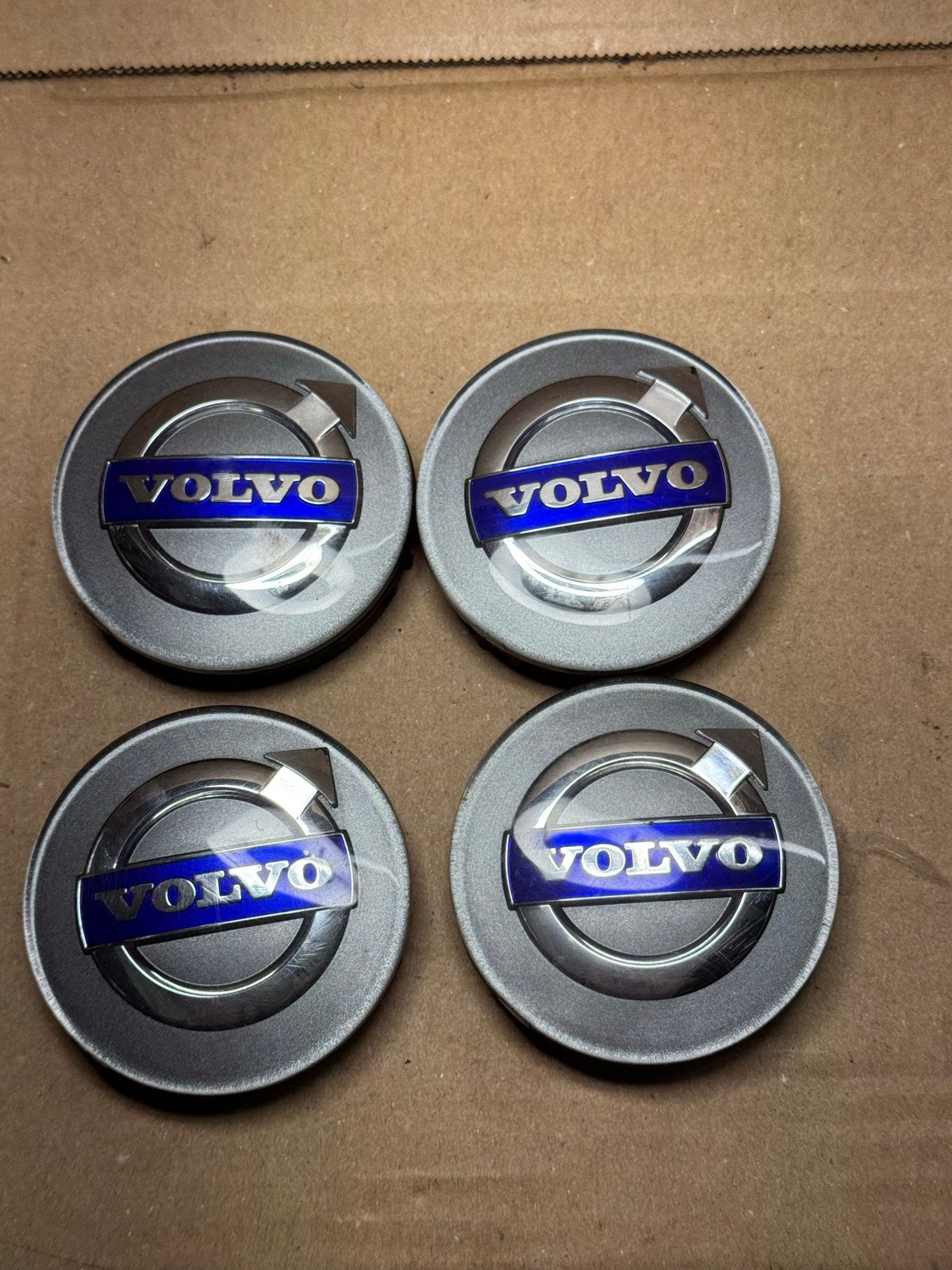 Originele Volvo Naafdoppen 64mm - Set van 4, Ophalen of Verzenden, Gebruikt