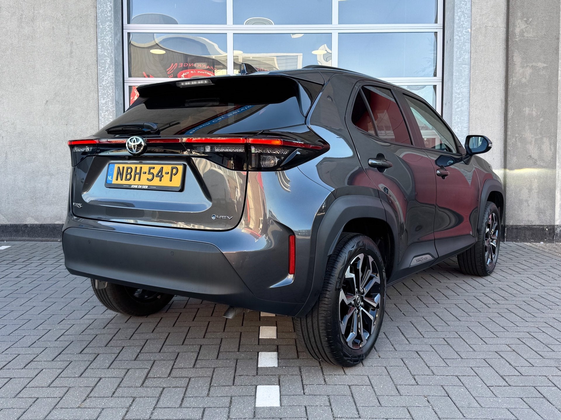 Toyota Yaris Cross 1.5 Hybrid 115 Dynamic|Comfort Pakket|App, Auto's, Stof, Gebruikt, 1165 kg, 116 pk