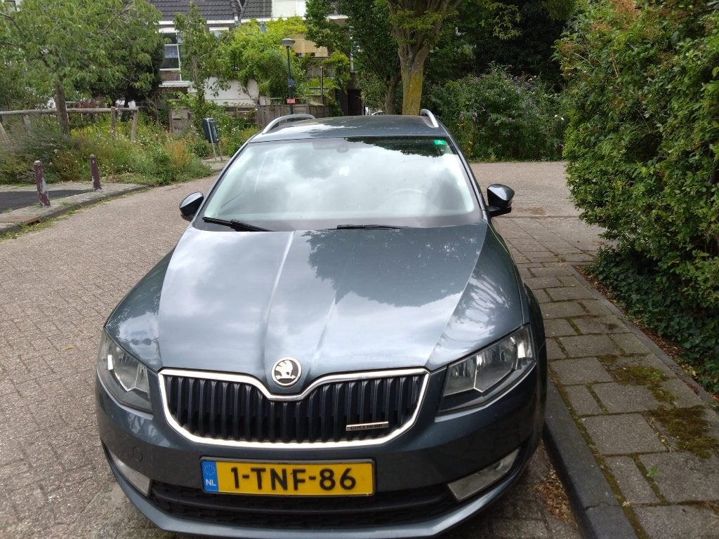 Skoda Octavia 1.6 TDI 81KW Combi 2014 Grijs, Auto's, Voorwielaandrijving, Zwart, 4 cilinders, Parkeersensor