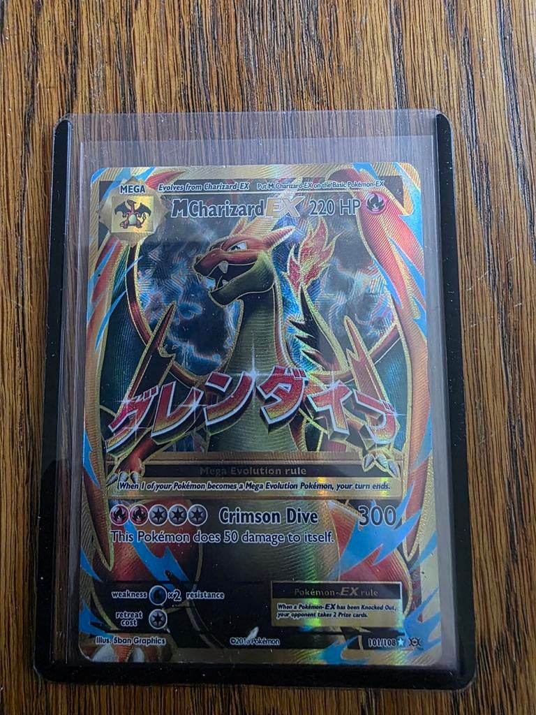 M Charizard EX, Ophalen of Verzenden, Zo goed als nieuw, Losse kaart, Foil