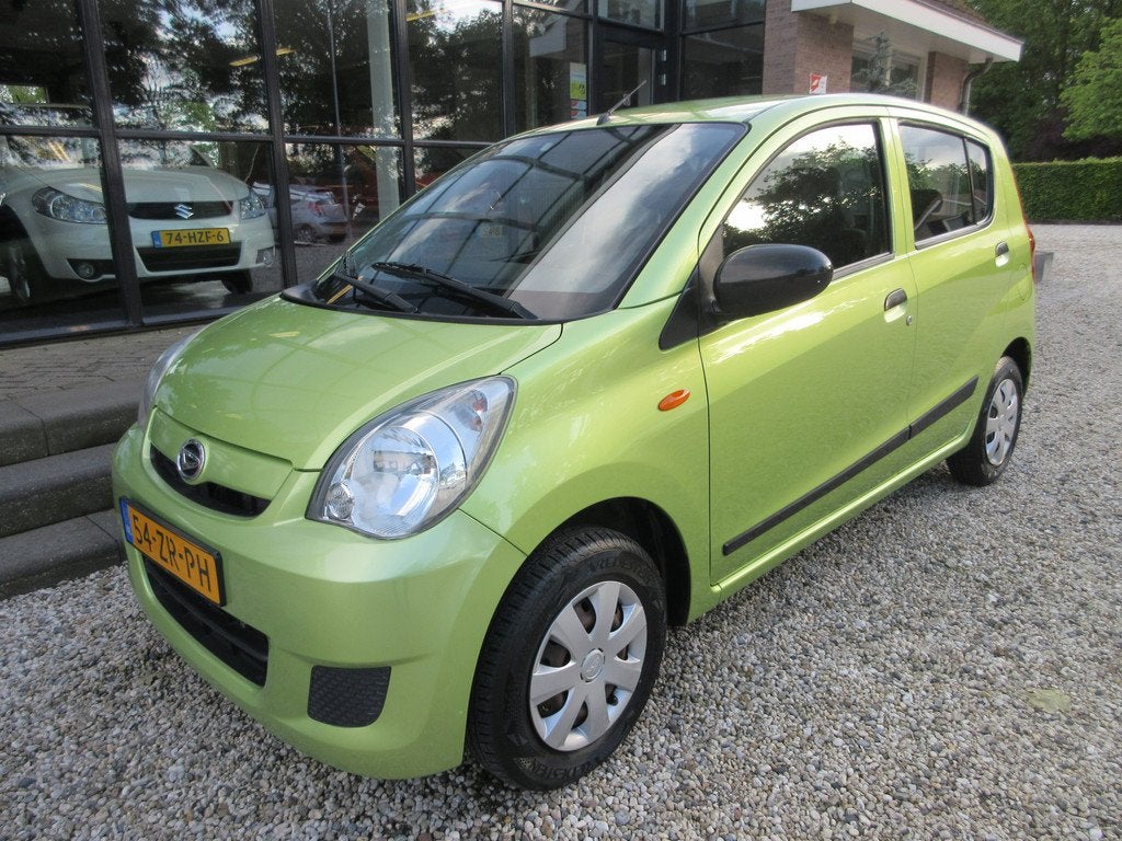 Daihatsu Cuore 1.0 navigatie (bj 2008), Auto's, Voorwielaandrijving, Stof, Zwart, 18 €/maand