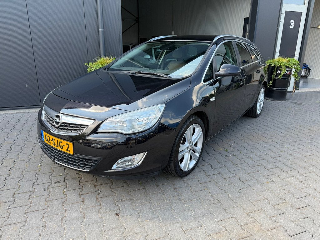 Opel Astra Sports Tourer 1.4 Turbo Cosmo, Voorwielaandrijving, Euro 5, Stof, Gebruikt