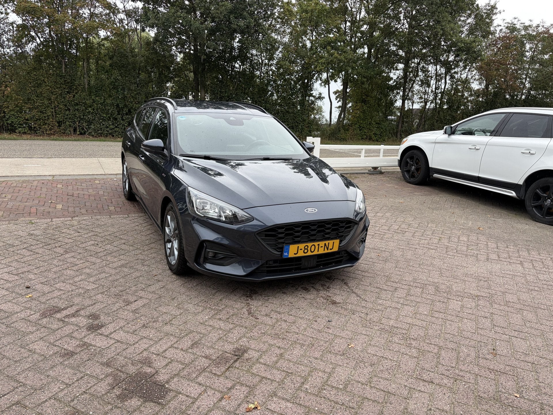 Ford FOCUS Wagon 1.0 EcoBoost Hybrid ST Line Business TREKHA, Auto's, Stof, Gebruikt, Blauw, Automatische klimaatregeling