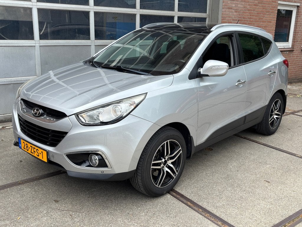 Hyundai Ix35 1.6i GDI Style NAP,PANO,CRUISE,CLIMAT,NAV,HALF, Auto's, Hyundai, Voorwielaandrijving, Euro 5, 4 cilinders, Leder en Stof