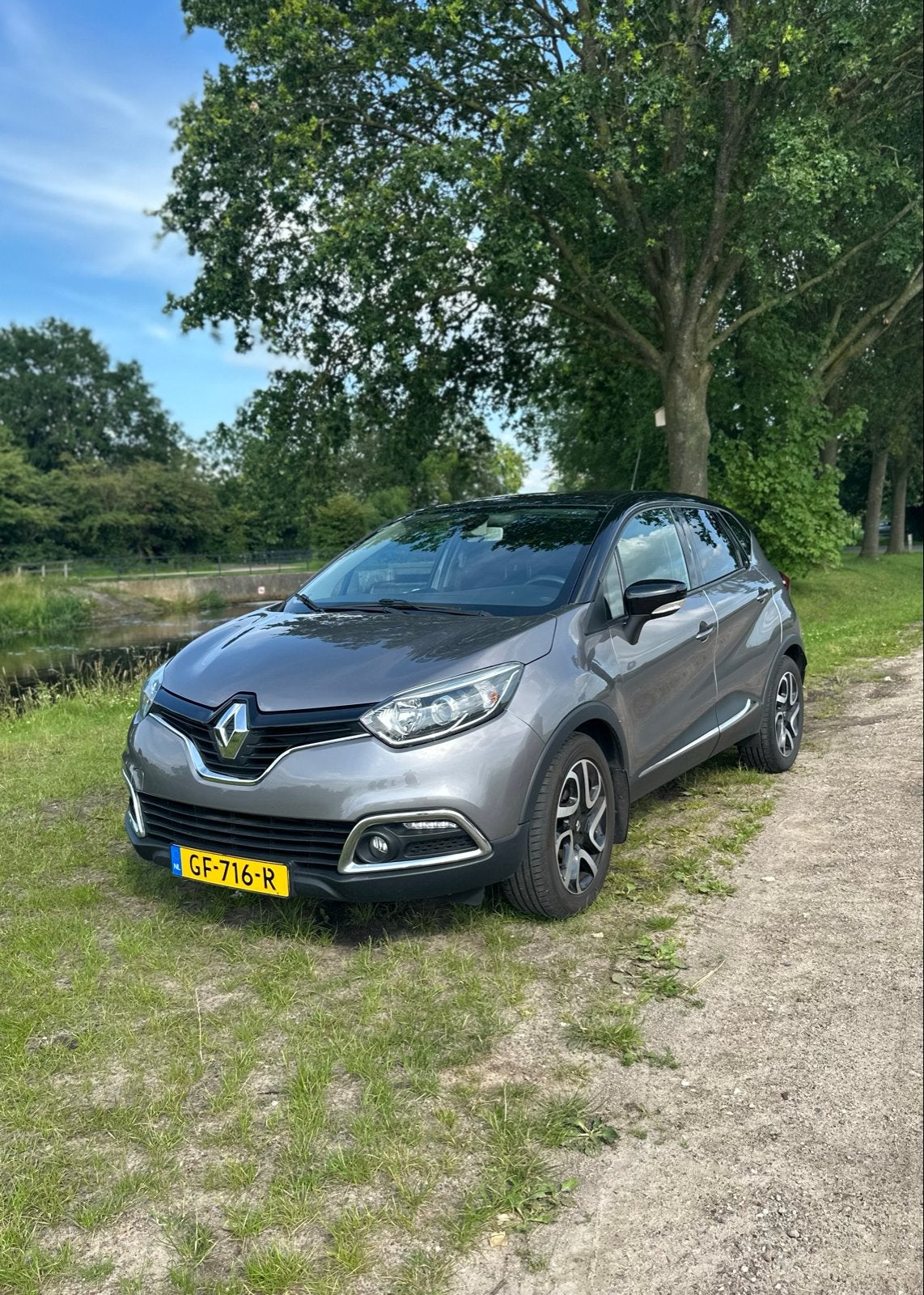 Renault Captur 1.2 TCE 120 EDC 2015 Grijs, Auto's, Stof, 625 kg, 4 cilinders, Origineel Nederlands