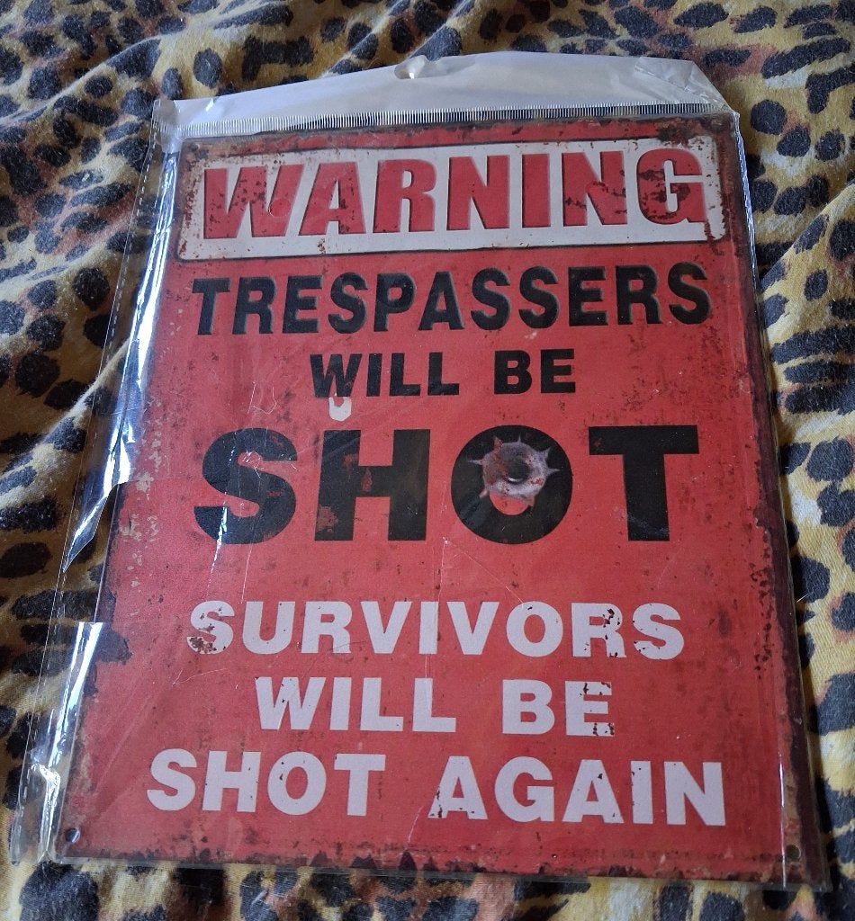 Metalen wandbord Trespassers will be shot..., Huis en Inrichting, Metaal, Nieuw, Wandbord of Wandpaneel, 20 cm