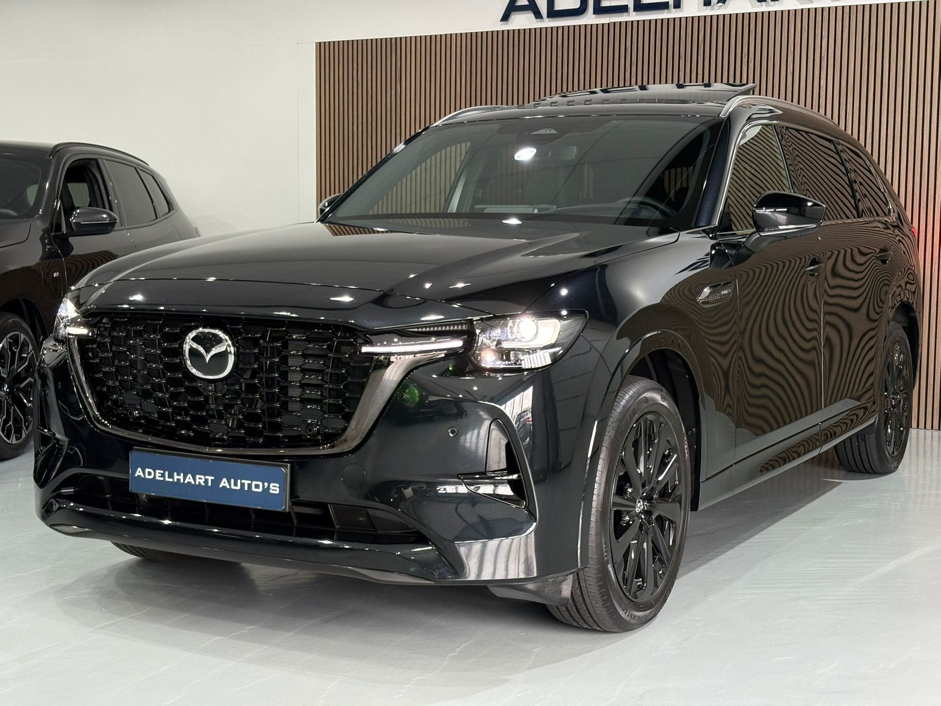 Mazda CX-80 2.5 e-SkyActiv PHEV Homura Plus 7 Pers 327 PK /, Auto's, Automaat, Dealer onderhouden, Gebruikt, Zwart