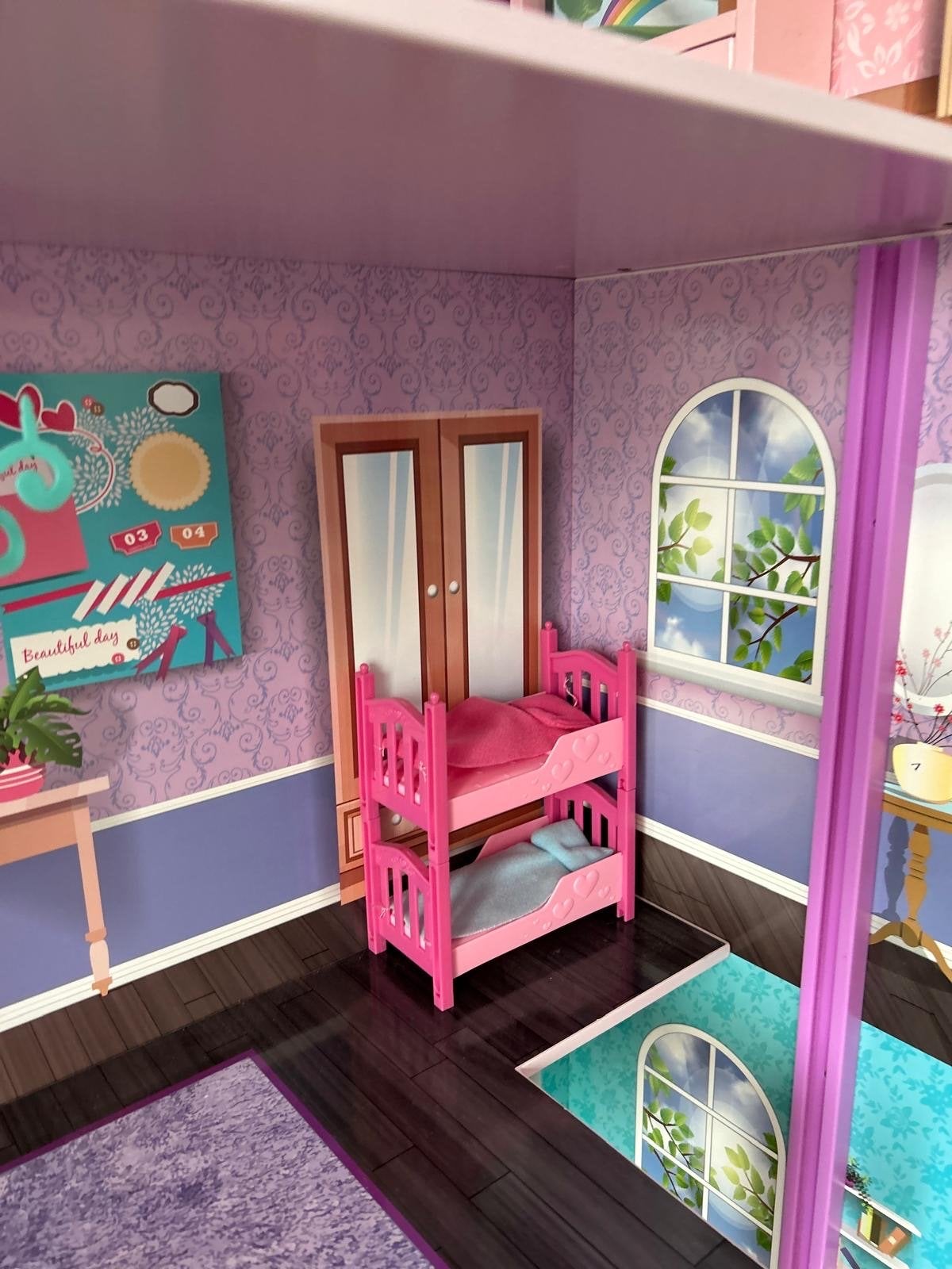 Foto 10 van Groot poppenhuis met veel accessoires en poppen
