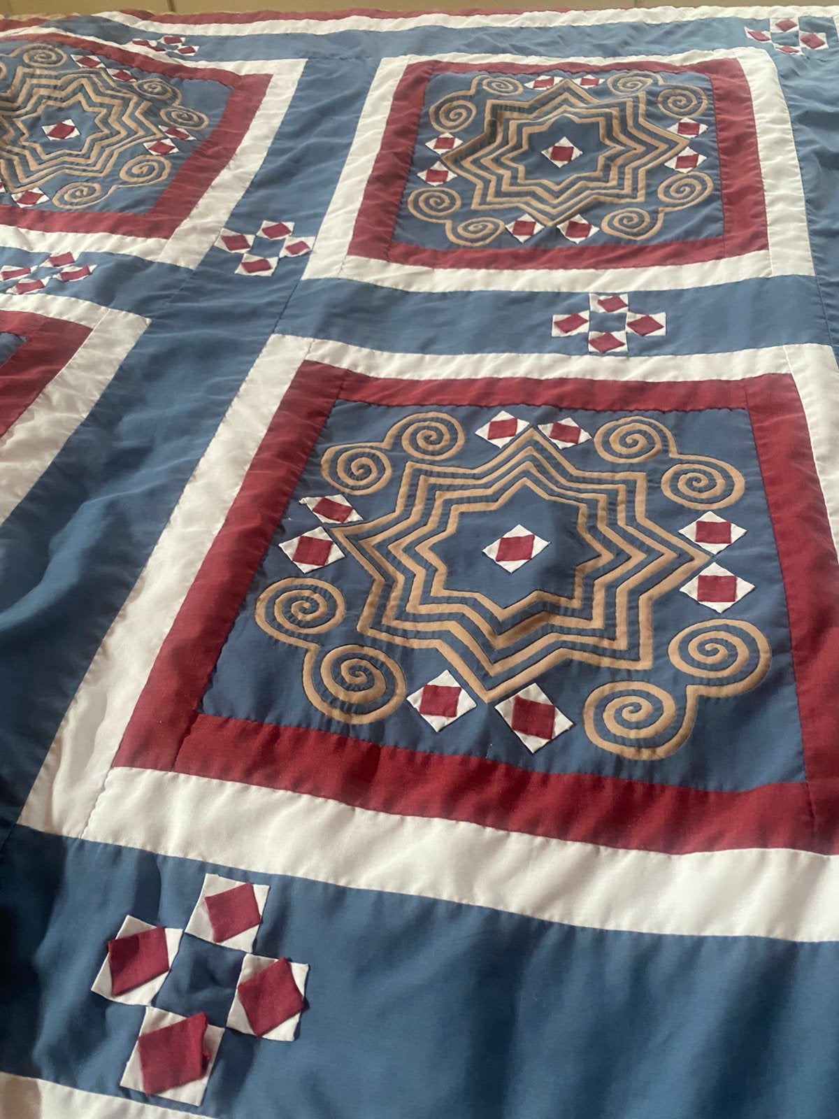 Patchwork sprei, Ophalen