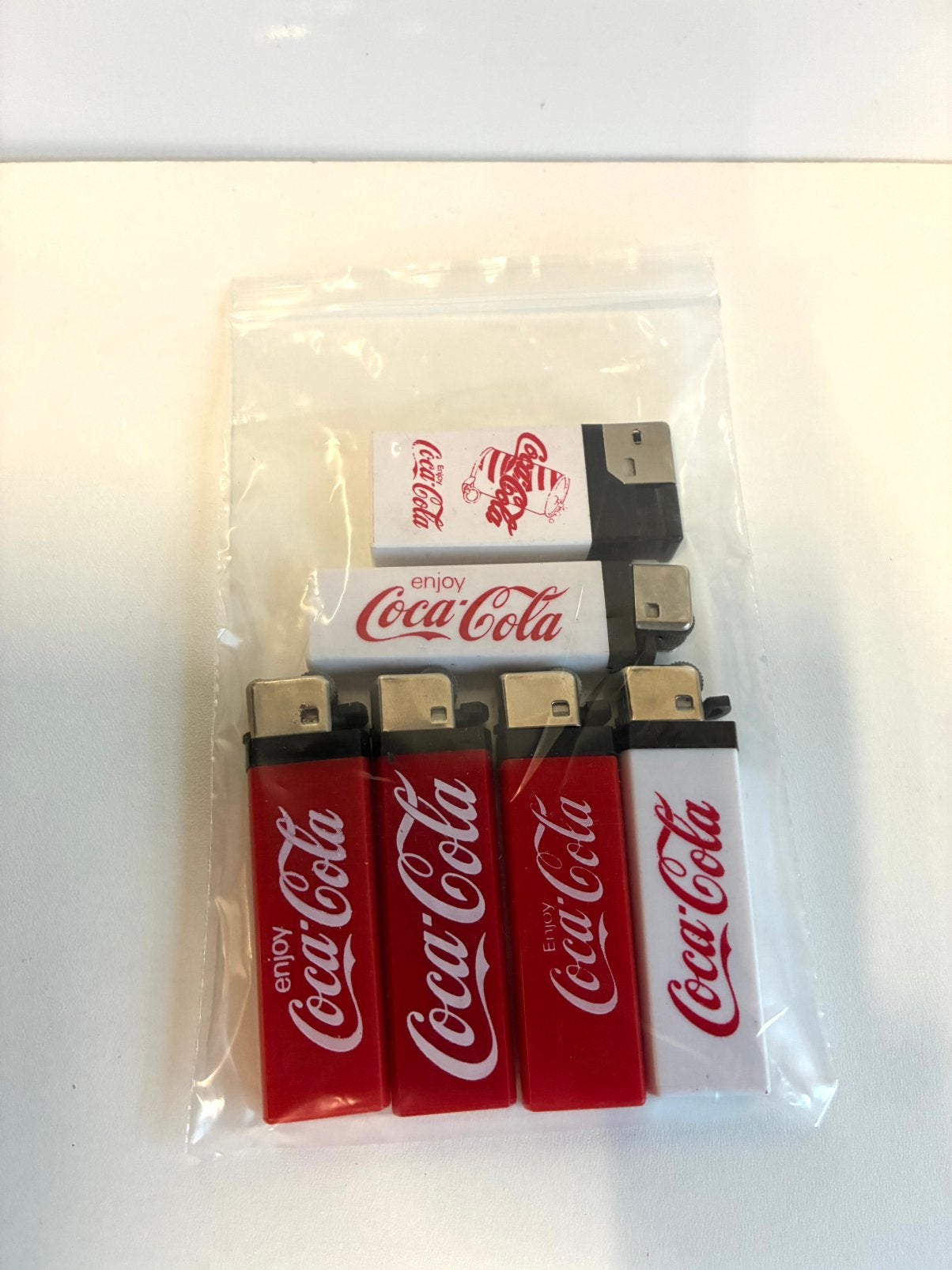 Prachtige aanstekers van Coca Cola, Ophalen of Verzenden, Zo goed als nieuw, Gebruiksvoorwerp