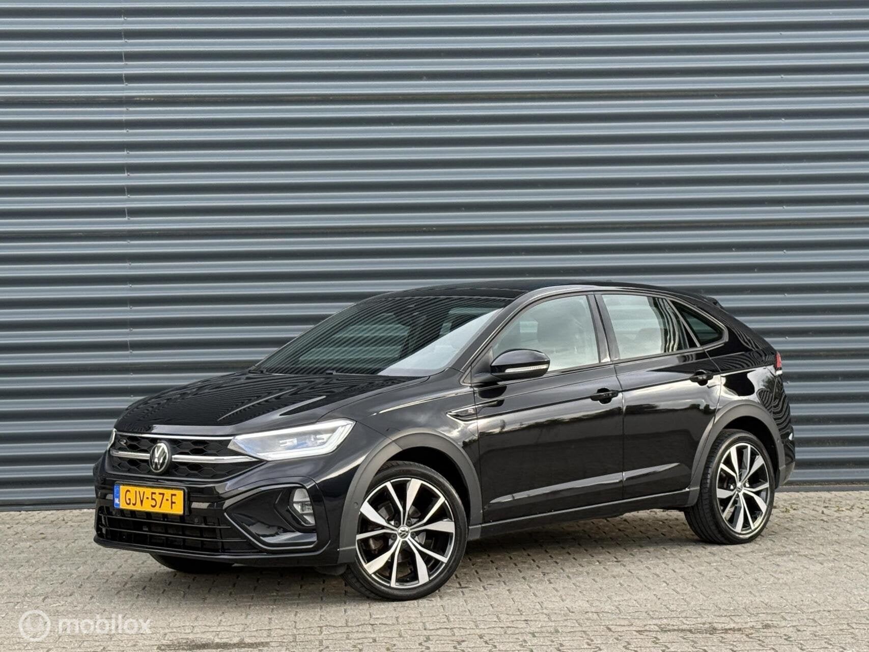 Volkswagen Taigo 1.0TSI R-Line|PANO|IQ|ACC|CARPLAY|, Auto's, Stof, Gebruikt, Euro 6, Zwart