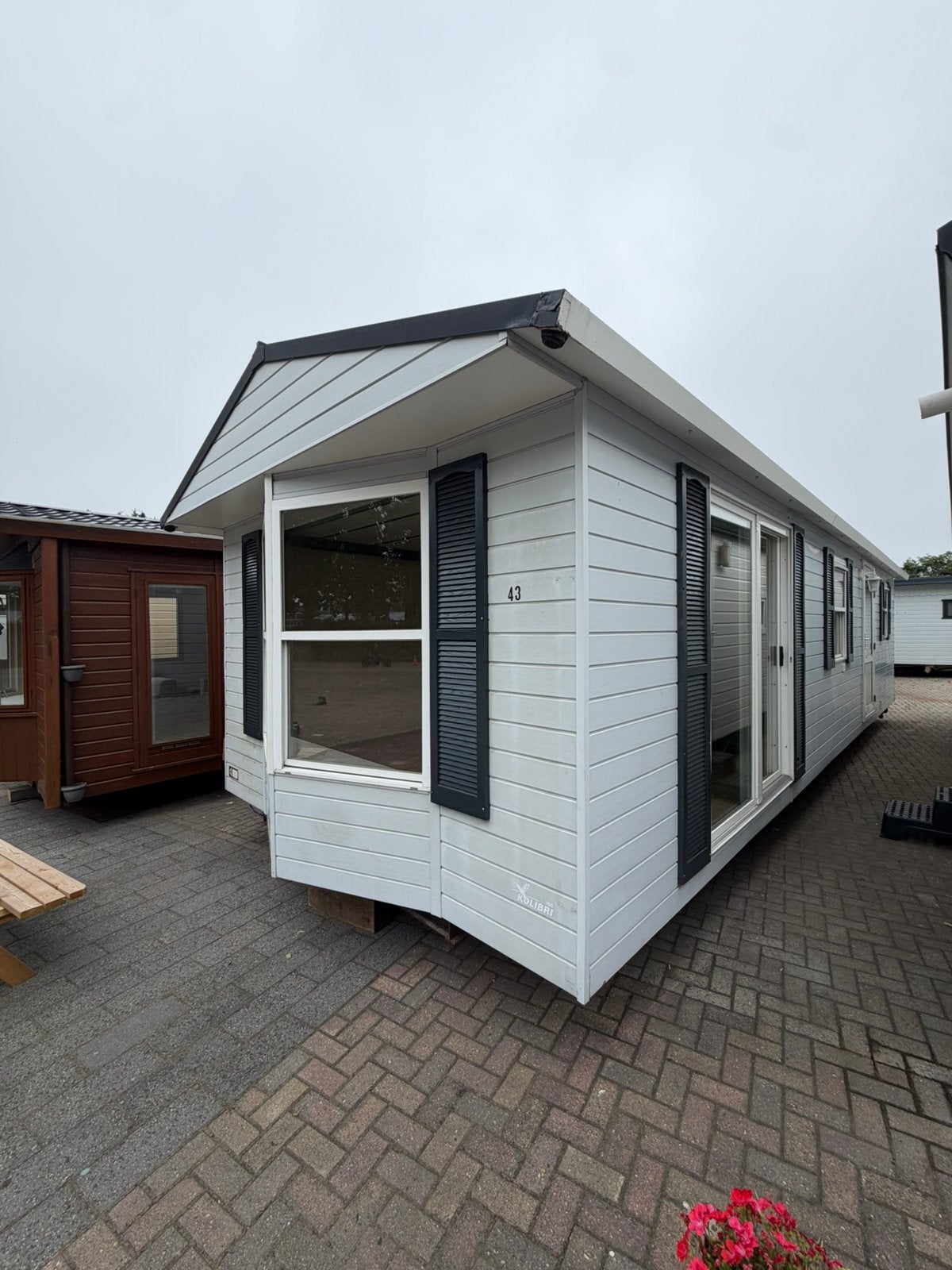 Likon Kolibri Kunstof Chalet te koop! 11.00m x 3.80m, Caravans en Kamperen