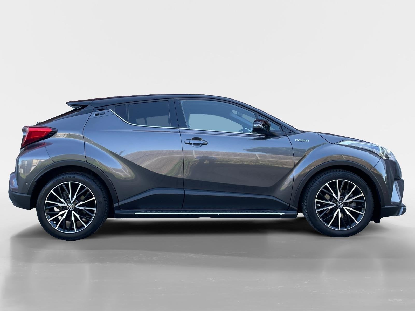 Toyota C-HR 1.8 Hybrid Bi-Tone | Side Bars| Leer| Lichtmetal, Auto's, 12 maanden, 4 cilinders, 122 pk, 26 km/l