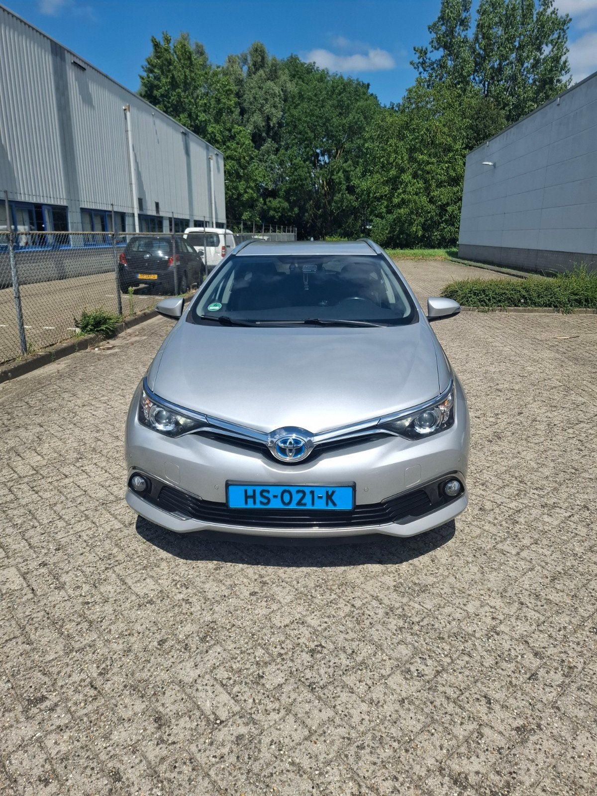 Toyota Auris 1.8 Hybrid Touring Sports CVT 2015 Grijs, Auto's, Toyota, 28 km/l, 345 kg, Origineel Nederlands, Te koop