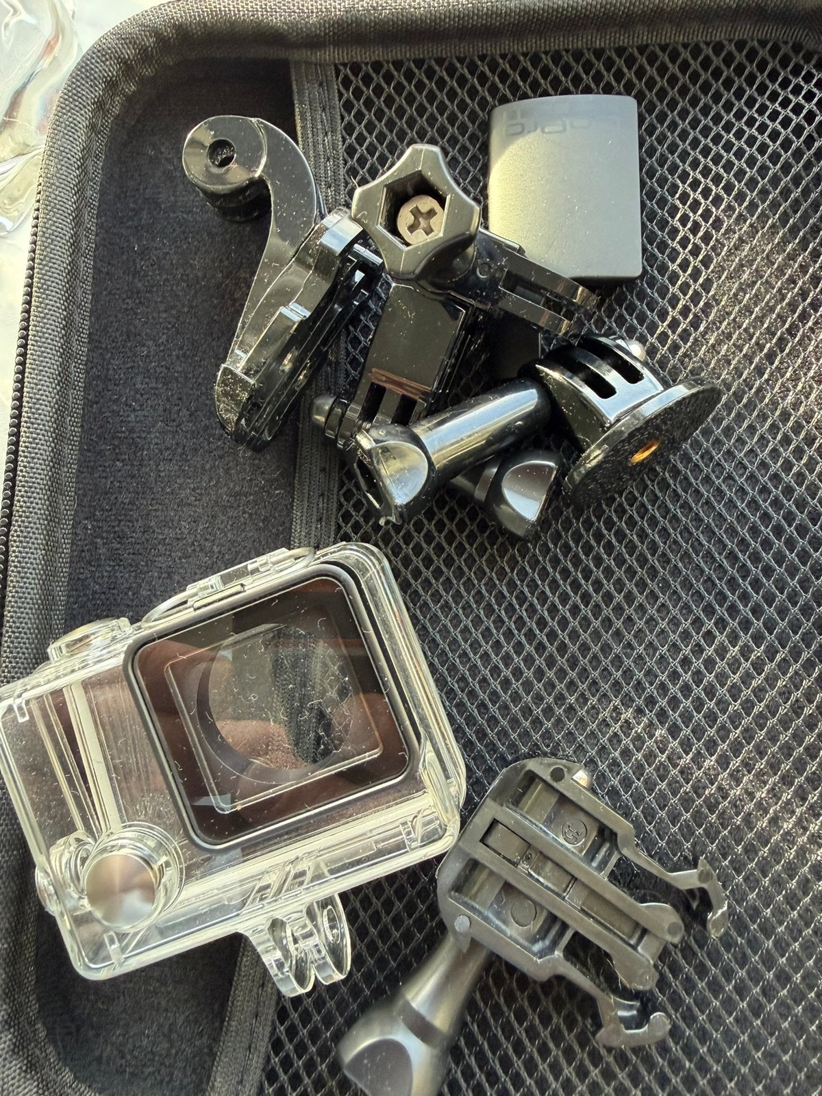 Foto 6 van GoPro Hero 4, met opbergtas, sd card en accessoires