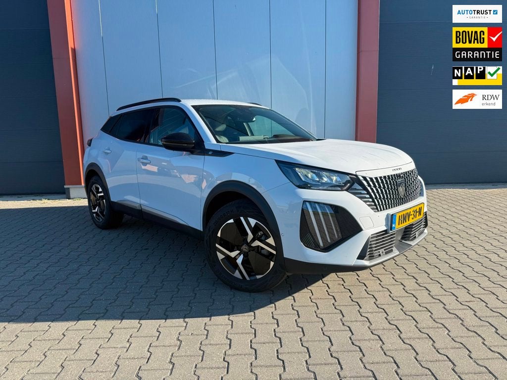 Peugeot E-2008 EV Allure Avantage 54 kWh, Auto's, Stof, Gebruikt, Zwart, 156 pk