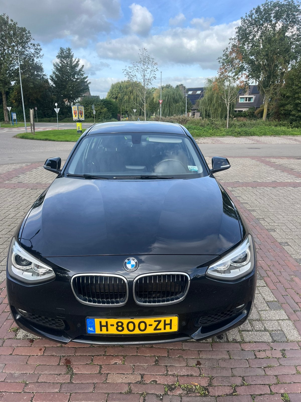 BMW 1-Serie 116i 136PK 5D Aut. 2013 Zwart, Auto's, 4 cilinders, Zwart, 1200 kg, 650 kg