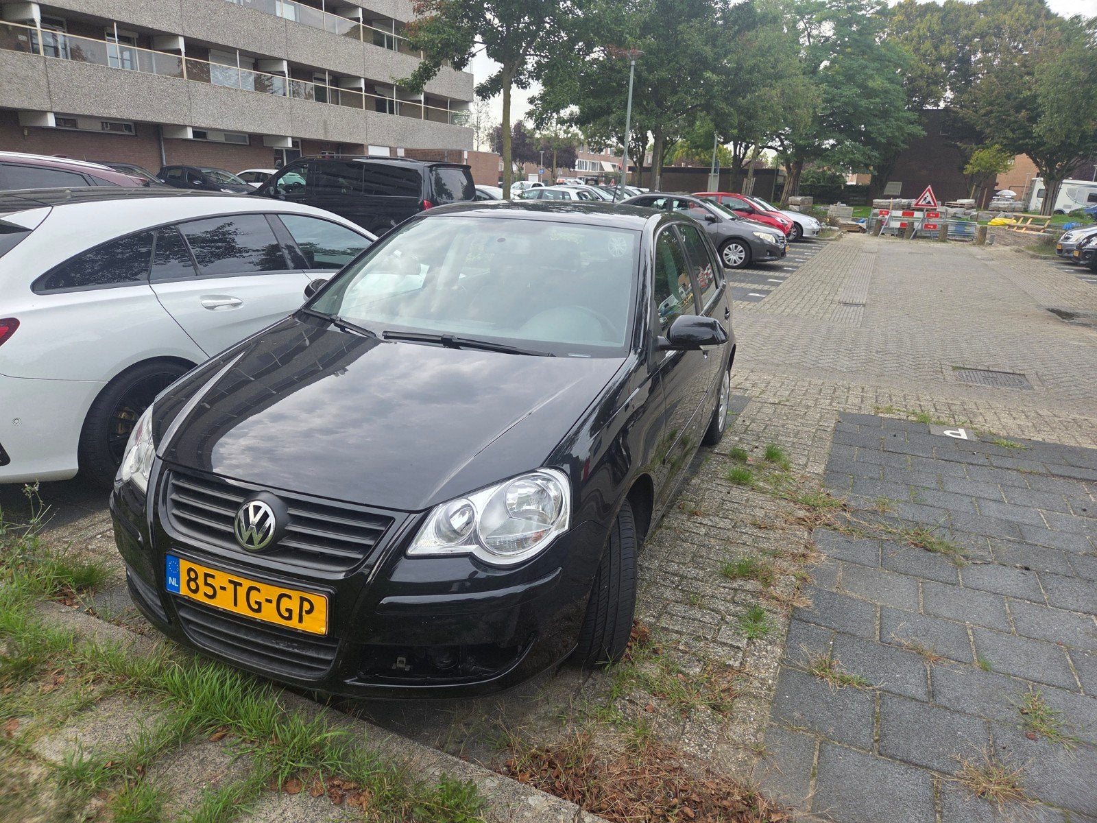 Volkswagen Polo 1.2 47KW 2006 Zwart, Auto's, Voorwielaandrijving, 540 kg, 1198 cc, Zwart