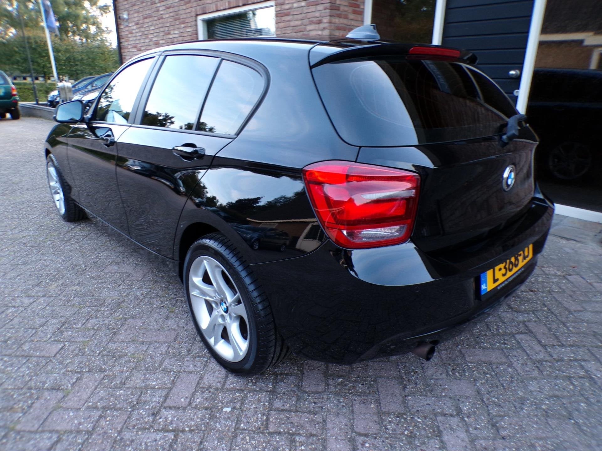 BMW 1-serie 114i EDE Business, Auto's, BMW, 1-Serie, Euro 5, Gebruikt, Zwart