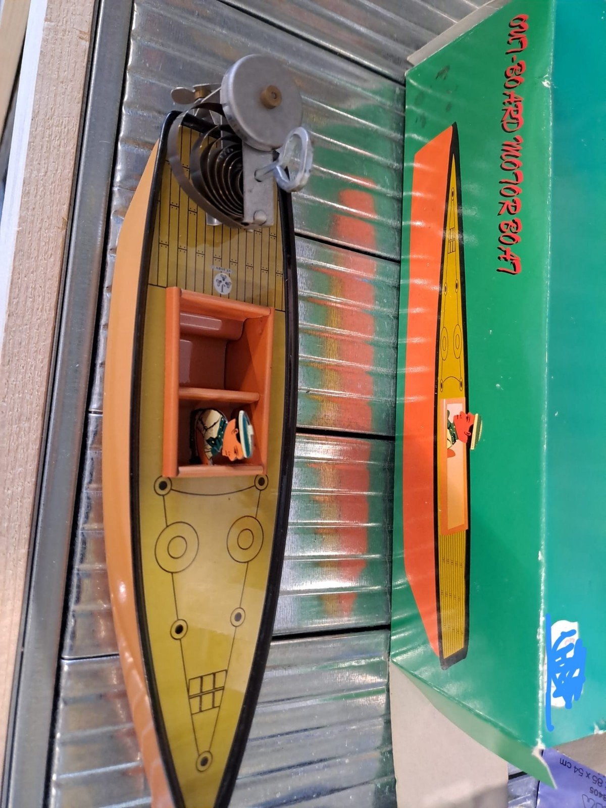 oud blikken speelgoed boot, Ophalen