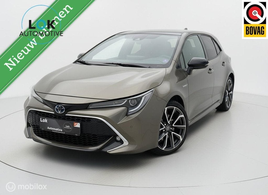 Toyota Corolla 2.0 Hybrid Executive JBL HUD|CAMERA|JBL|ACC|, Gebruikt, Zwart, 4 cilinders, Bruin