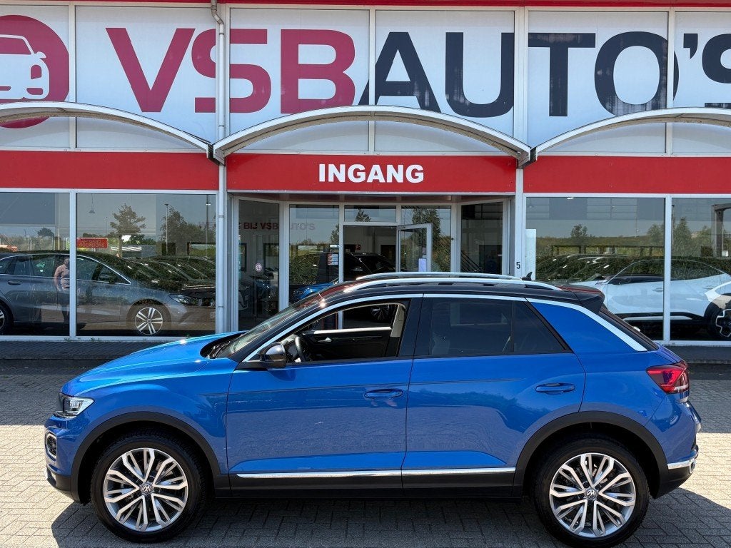 Volkswagen T-ROC 1.5 TSI ACT. SPORT 150PK DIGITALE-SCHERM WI, Auto's, Volkswagen, Huisgarantie, Blauw, Leder, Bedrijf