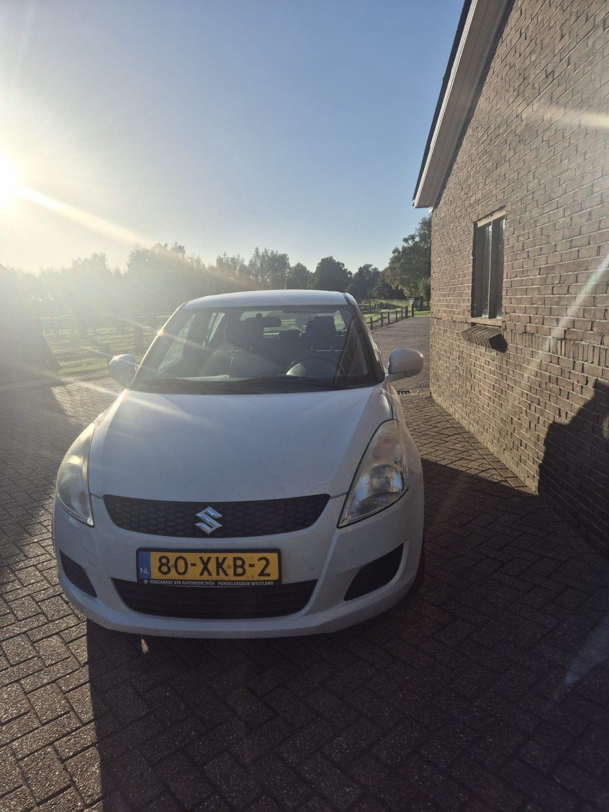 Suzuki Swift 1.2 5-D 2012 Wit, Auto's, Voorwielaandrijving, 4 cilinders, 400 kg, Origineel Nederlands