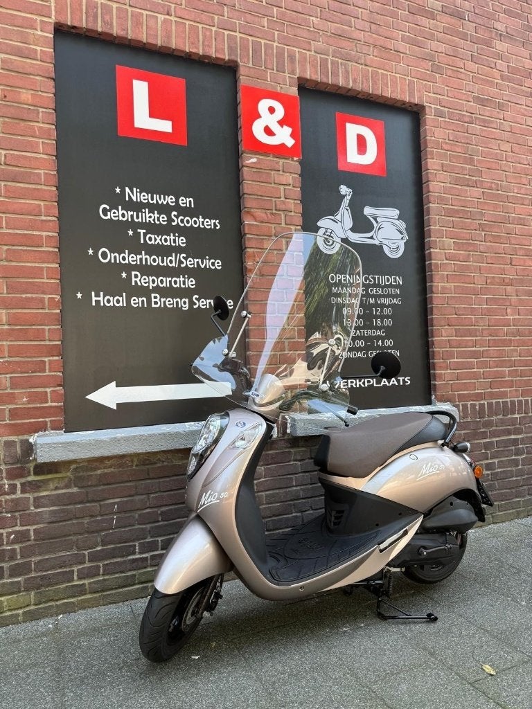 Te Koop Sym mio ( blauw kenteken ), Ophalen, Zo goed als nieuw, 50 cc, Maximaal 25 km/u