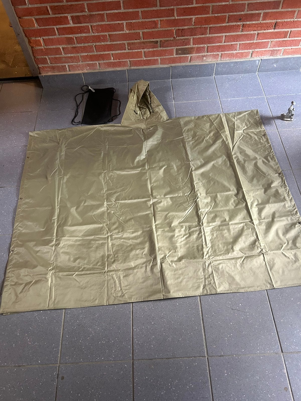 Nike poncho regenjas H110cm bij B148cm met handig tasje, Ophalen of Verzenden, Zo goed als nieuw, Regenjas