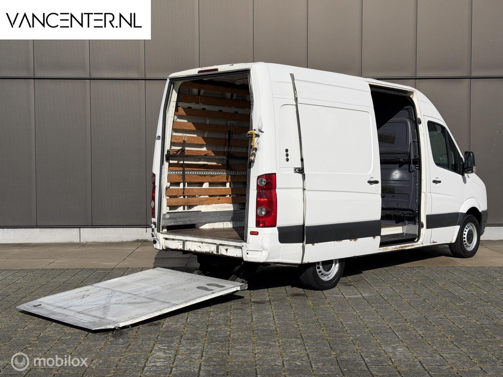 Volkswagen Crafter 2.5 TDI L2H2 Dhollandia Lift Laadklep APK, Auto's, Gebruikt, 2000 kg, Volkswagen, Origineel Nederlands