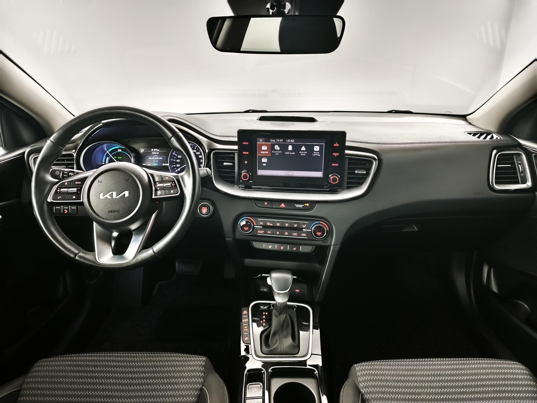Kia Ceed Sportswagon 1.6 GDI PHEV DynamicPlusLine | Stoelver, Auto's, Gebruikt, Met garantie (alle), Leder en Stof, Zwart