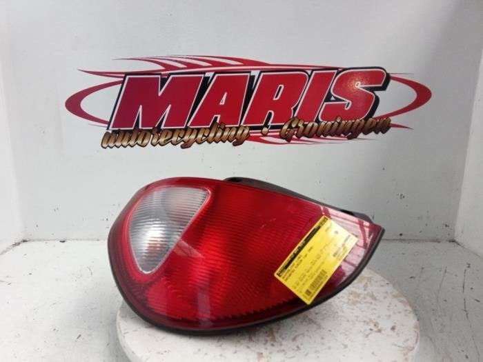 Achterlicht links van een Daihatsu Sirion, Gebruikt, Daihatsu, -, -