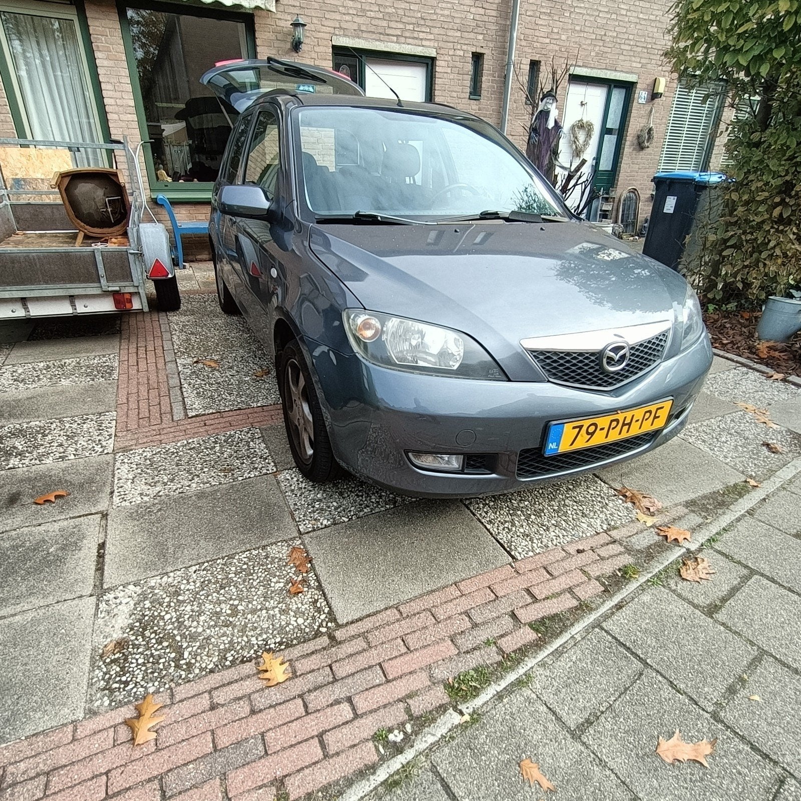 Mazda 2 1.6 16V Touring 2004 ruime apk Grijs €1250, Auto's, Voorwielaandrijving, 1596 cc, 4 cilinders, 49 €/maand