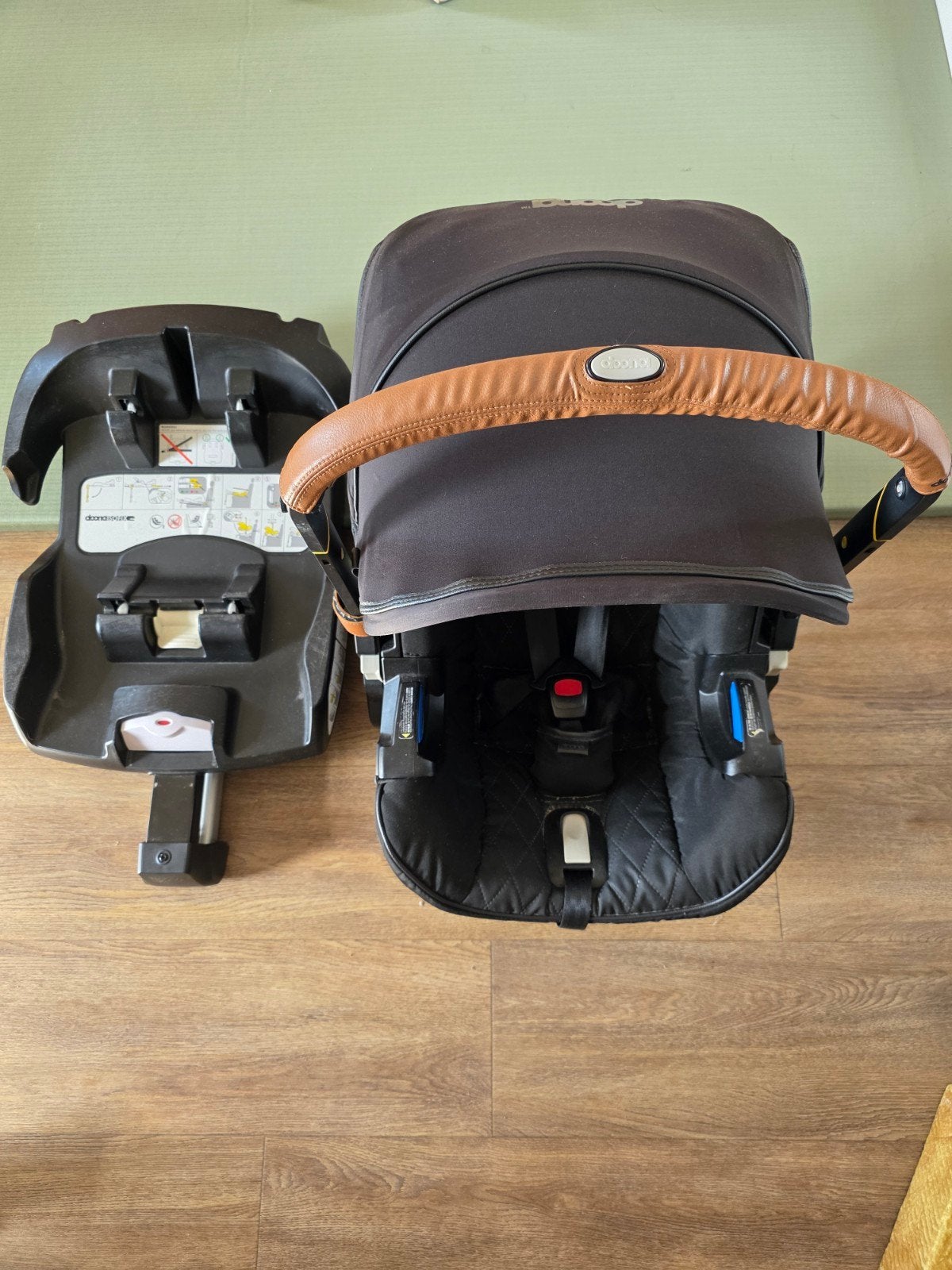 Doona+ autostoel met Isofix, regenhoes, muskietennet en tas, Kinderen en Baby's, Autostoeltjes, Zo goed als nieuw, Isofix, 0 t/m 13 kg