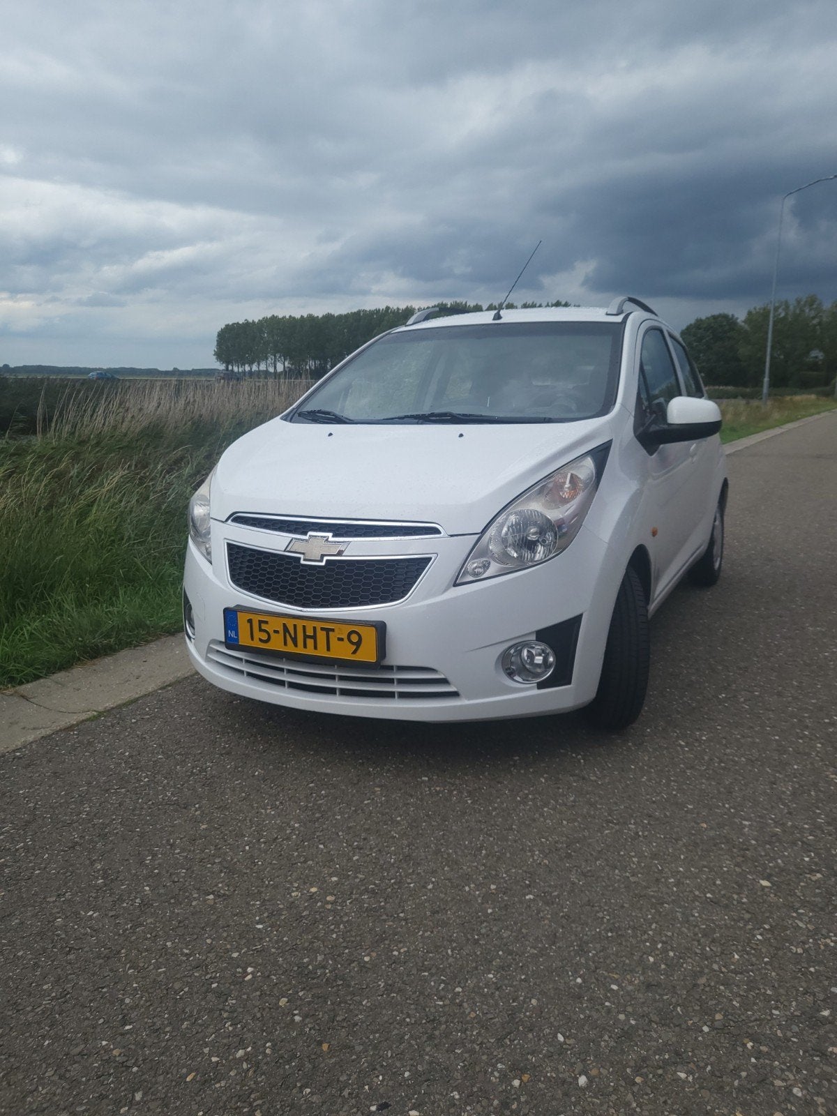 Chevrolet Spark 1.0 Bifuel 2010 Wit, Auto's, Chevrolet, 15 km/l, 37 €/maand, 4 cilinders, Wit