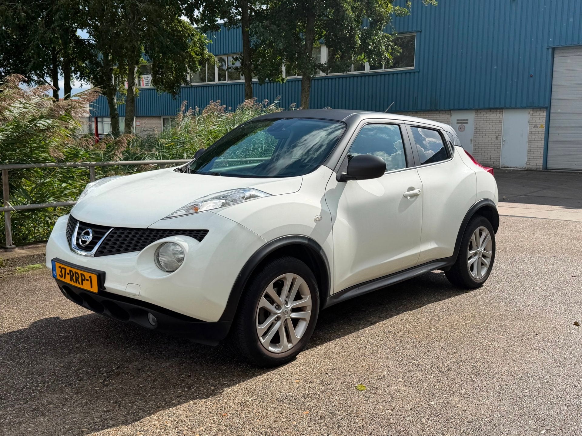 Nissan Juke 1.6 Tekna Automaat! Clima! Navi! Camera! NAP!, Auto's, Euro 5, SUV of Terreinwagen, 117 pk, 609 kg