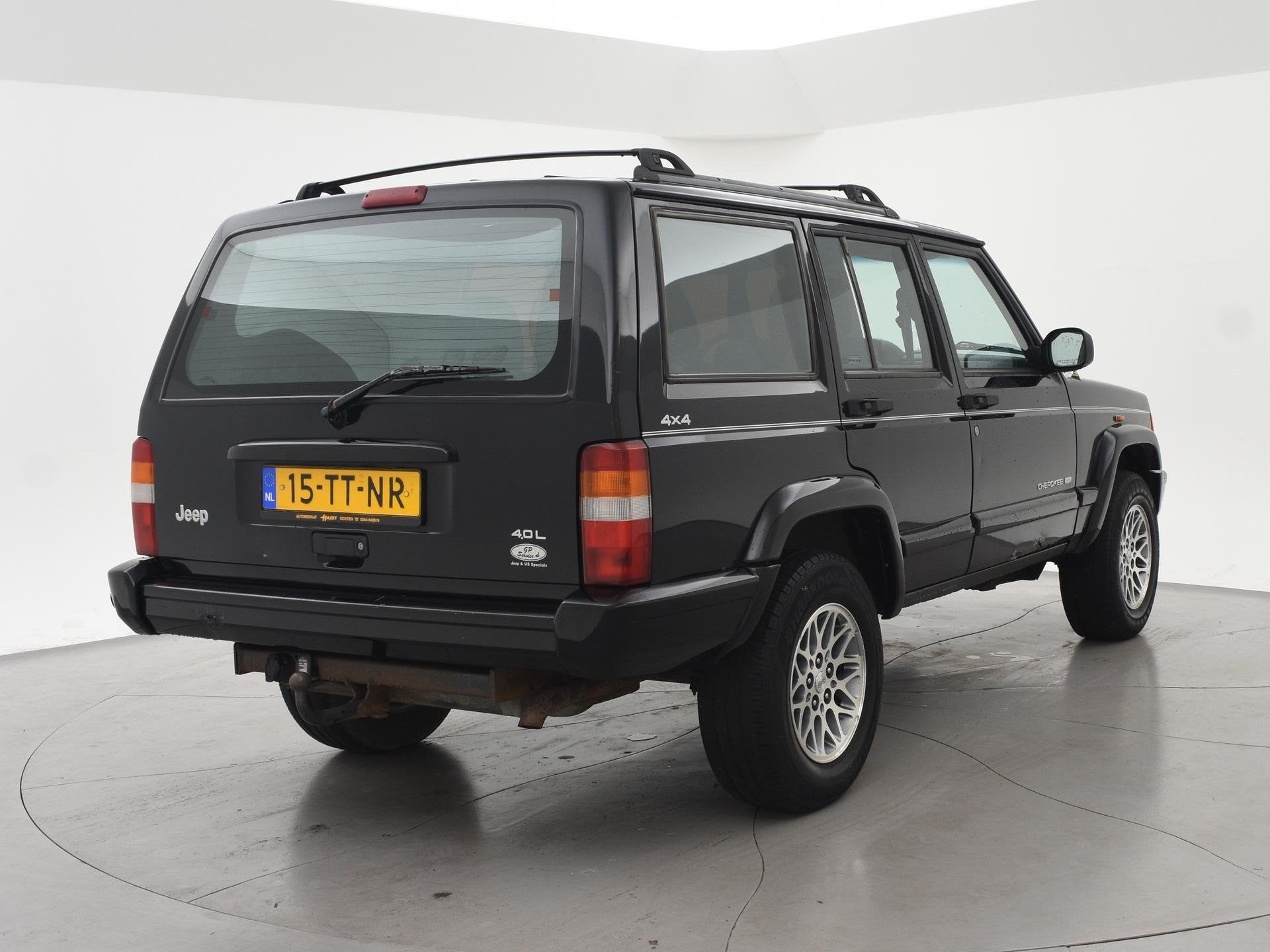 Jeep Cherokee 4.0i LPG-G3 4X4 AUT. LIMITED + LEDER | 3250 KG, Automaat, Gebruikt, Stoelverwarming, Zwart