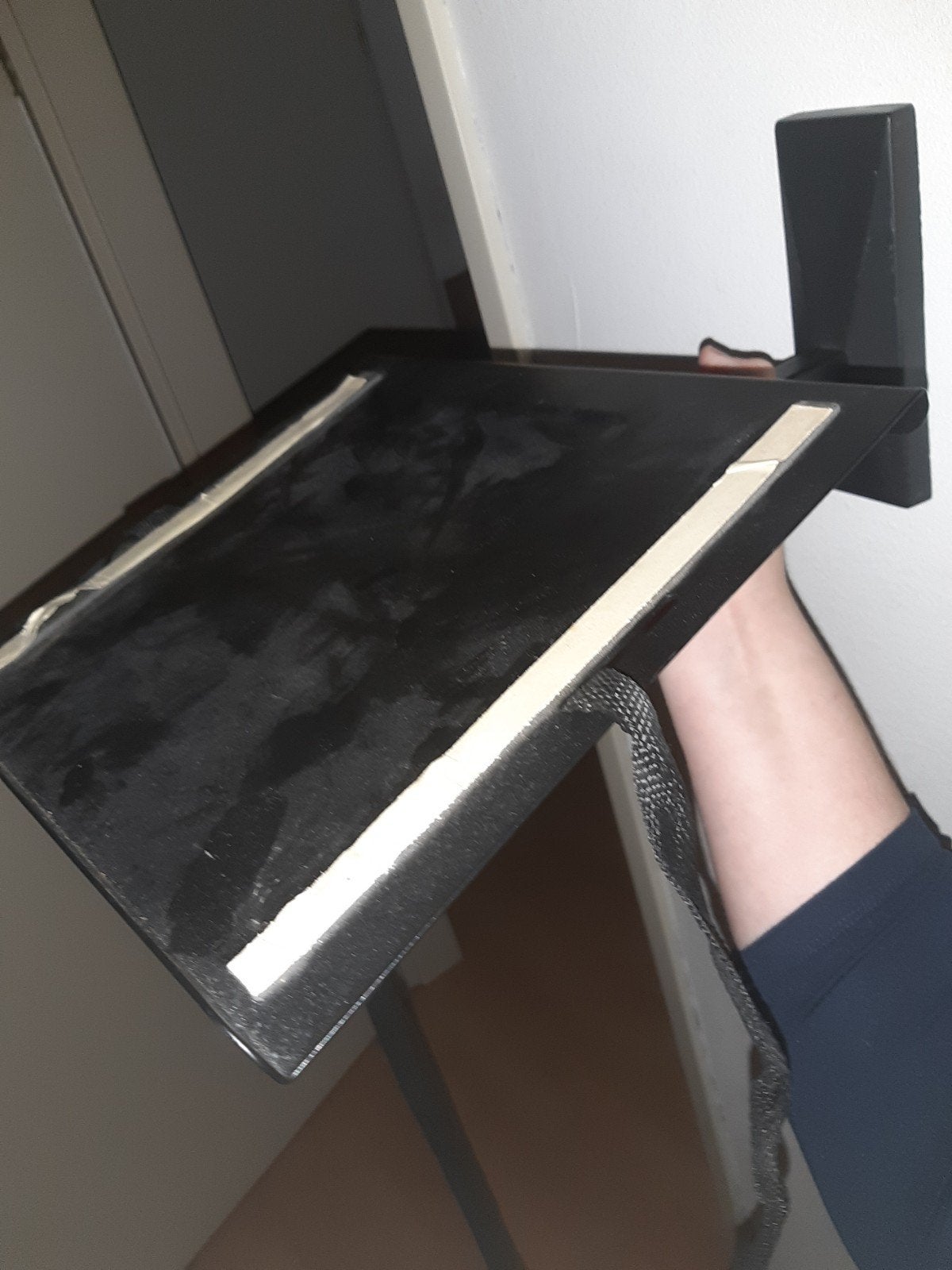 Tv beugel, Ophalen