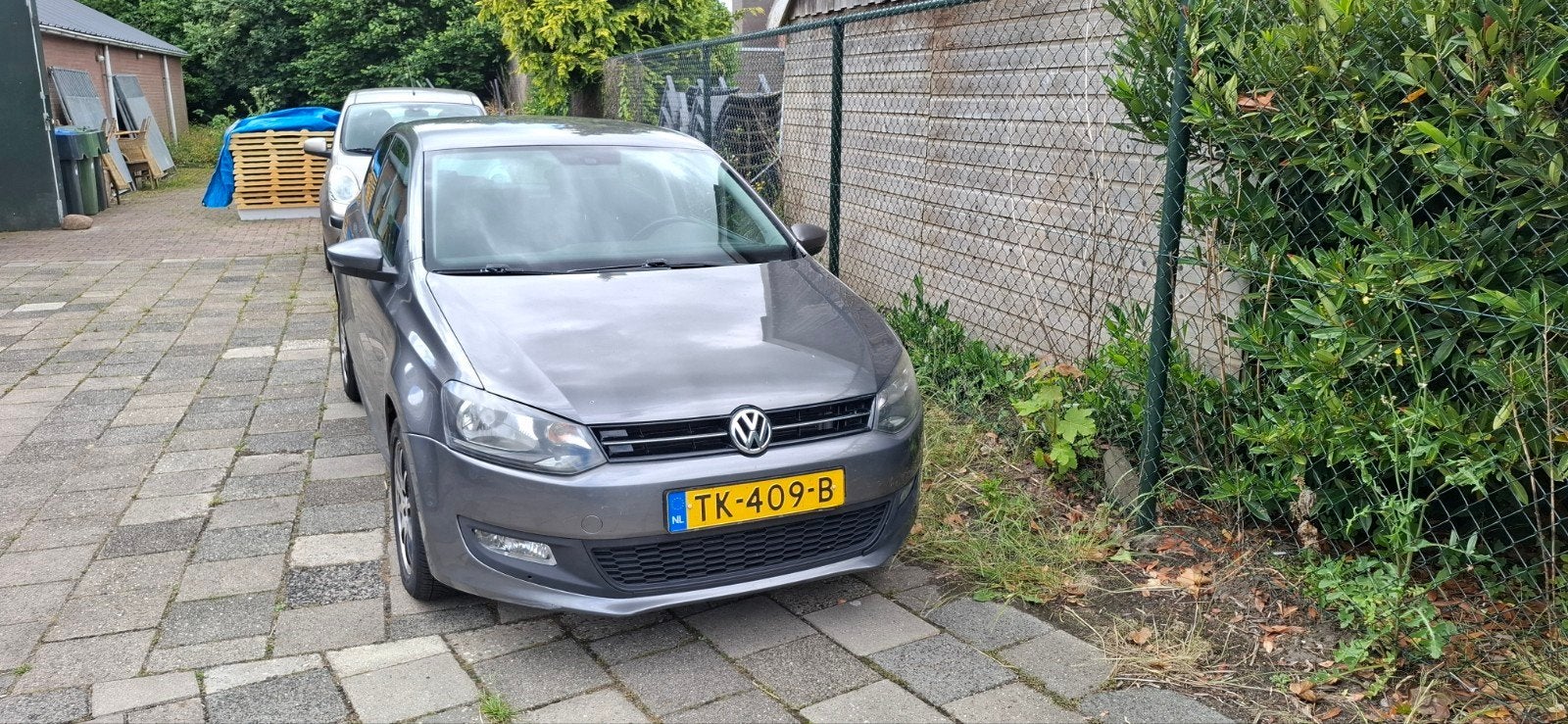 Volkswagen Polo 1.6 TDI 66KW 2010 Grijs, Voorwielaandrijving, Elektrische ramen, Stof, Zwart