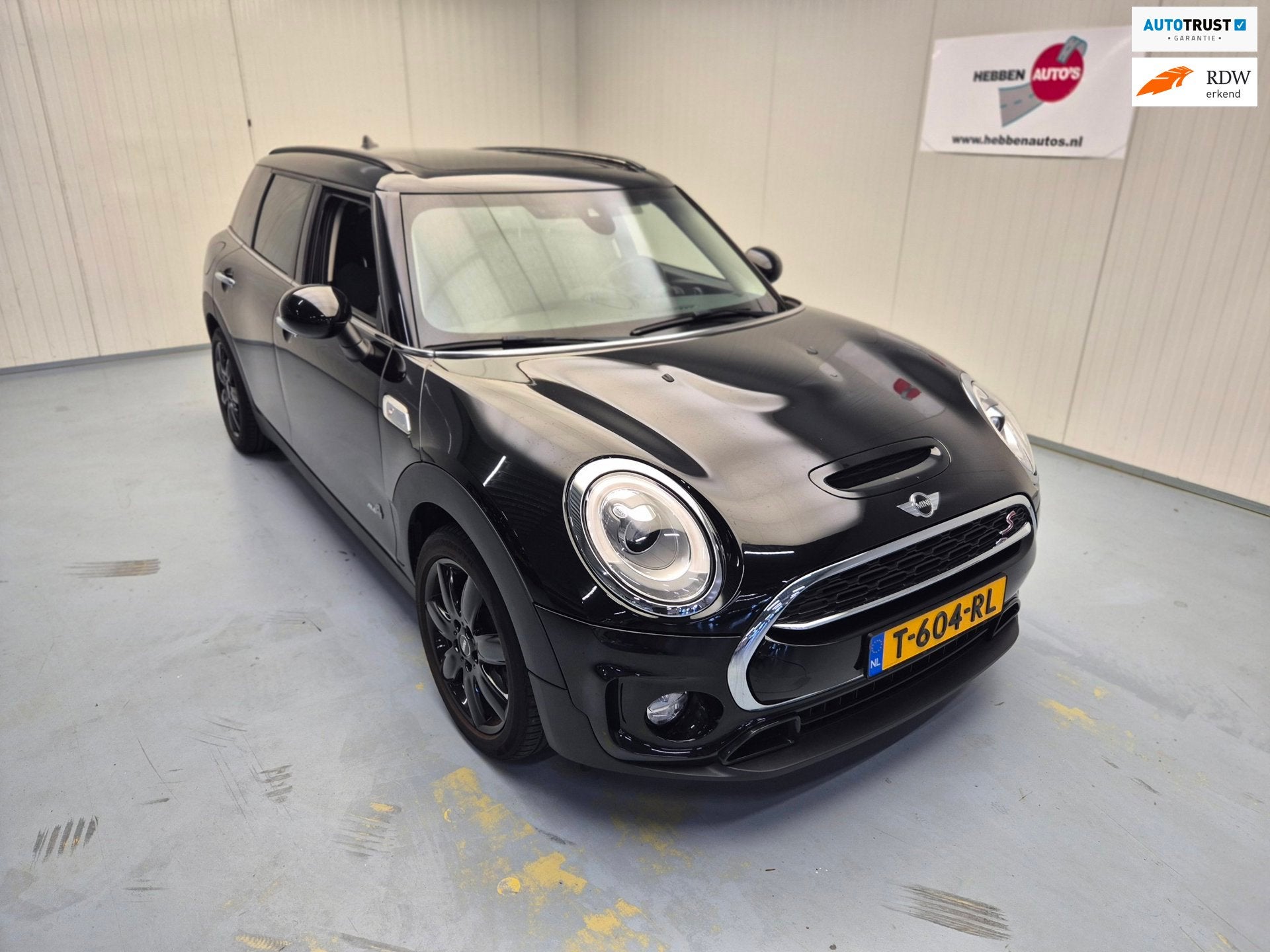 Mini Clubman 2.0 Cooper S 4x4 Chili Serious Business Navi Ec, Auto's, Mini, Gebruikt, Leder en Stof, Zwart, 14 km/l