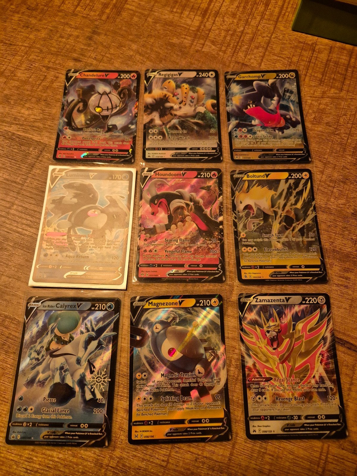 Pokémon V-kaarten Collectie - Chandelure, Regigigas, Garchom, Ophalen of Verzenden, Zo goed als nieuw, Meerdere kaarten