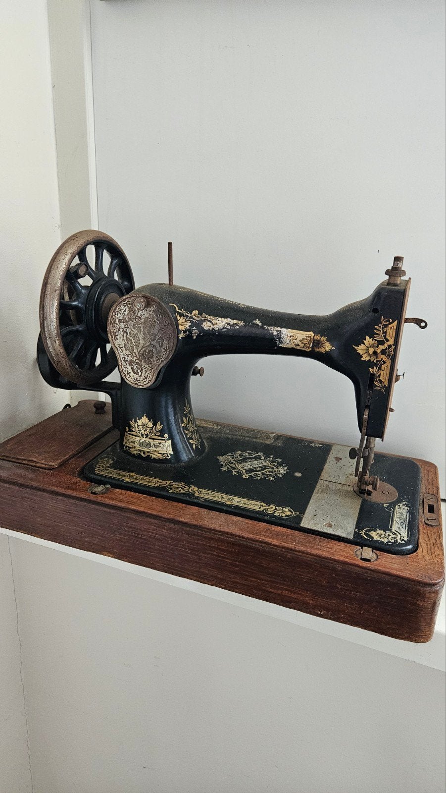 Singer naaimachine., Ophalen