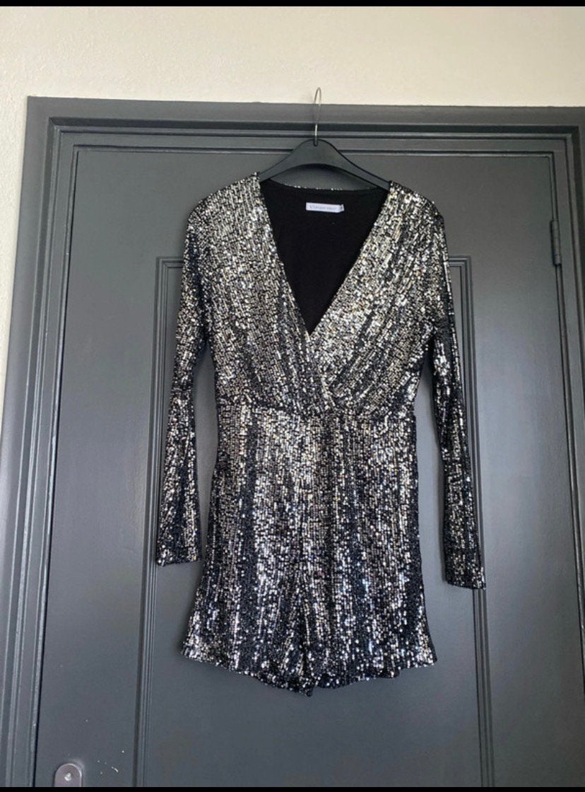 Hele mooie glitter playsuit, Ophalen of Verzenden, Zo goed als nieuw, Zwart
