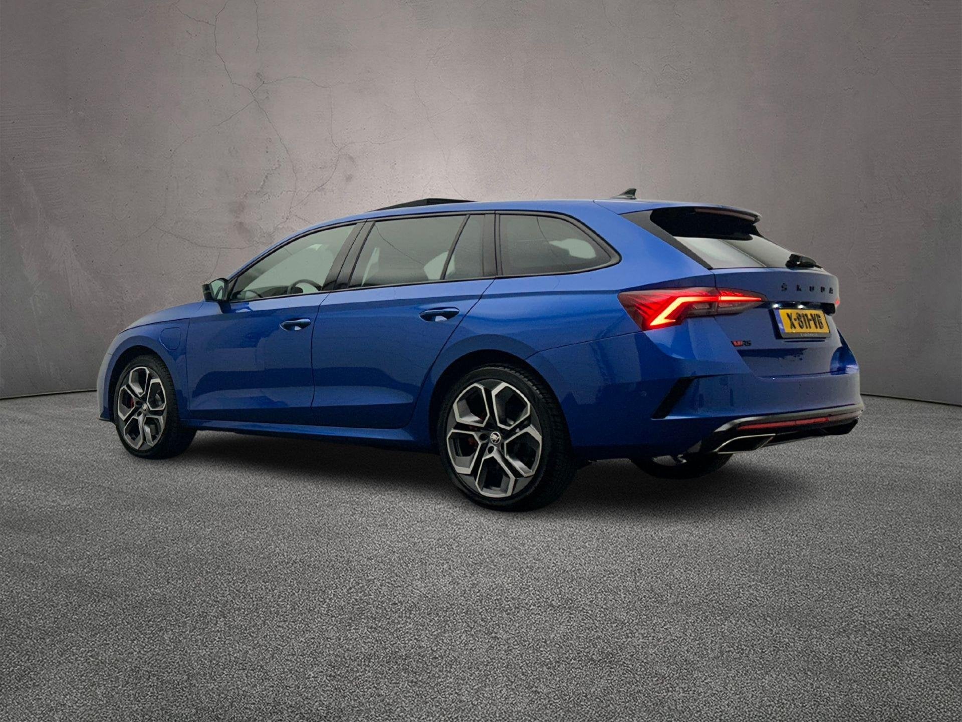 Skoda Octavia Combi RS Business 1.4 TSI PHEV 245pk DSG Autom, Auto's, Stof, Gebruikt, 4 cilinders, Blauw